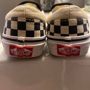 Vans black and white checkered slip on
